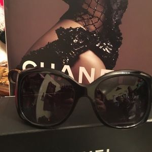Black classic Chanel with pearl sunglasses